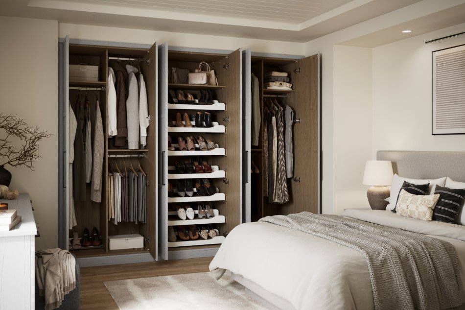 A large fitted wardrobe with the doors open and clothes and shoes visible