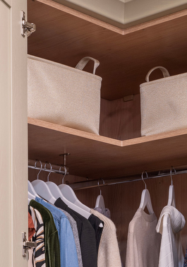 Corner fitted wardrobe maximising bedroom space