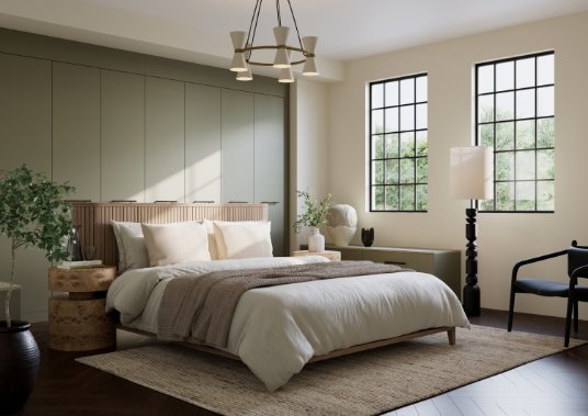 green fitted wardrobe in a double bed bedroom