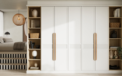 white bedroom with fitted wardrobes