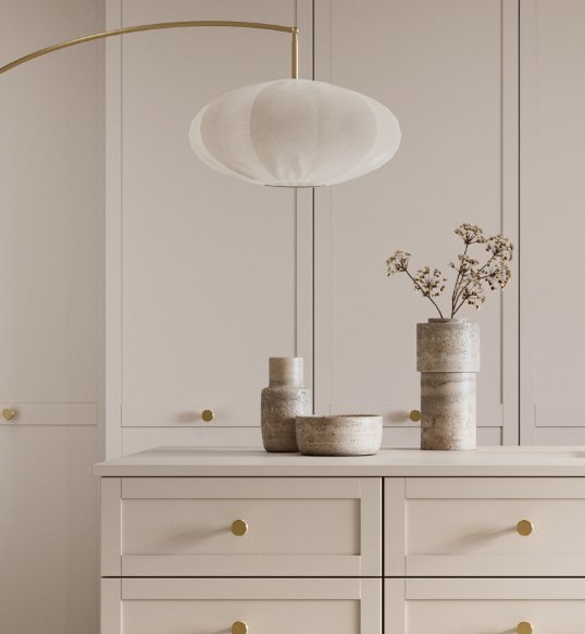 white lamp and cupoad stroage infront of a white wardrobe