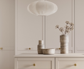 white lamp and cupoad stroage infront of a white wardrobe