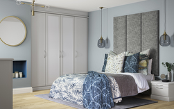 Libretto fitted bedroom furniture in light grey finish